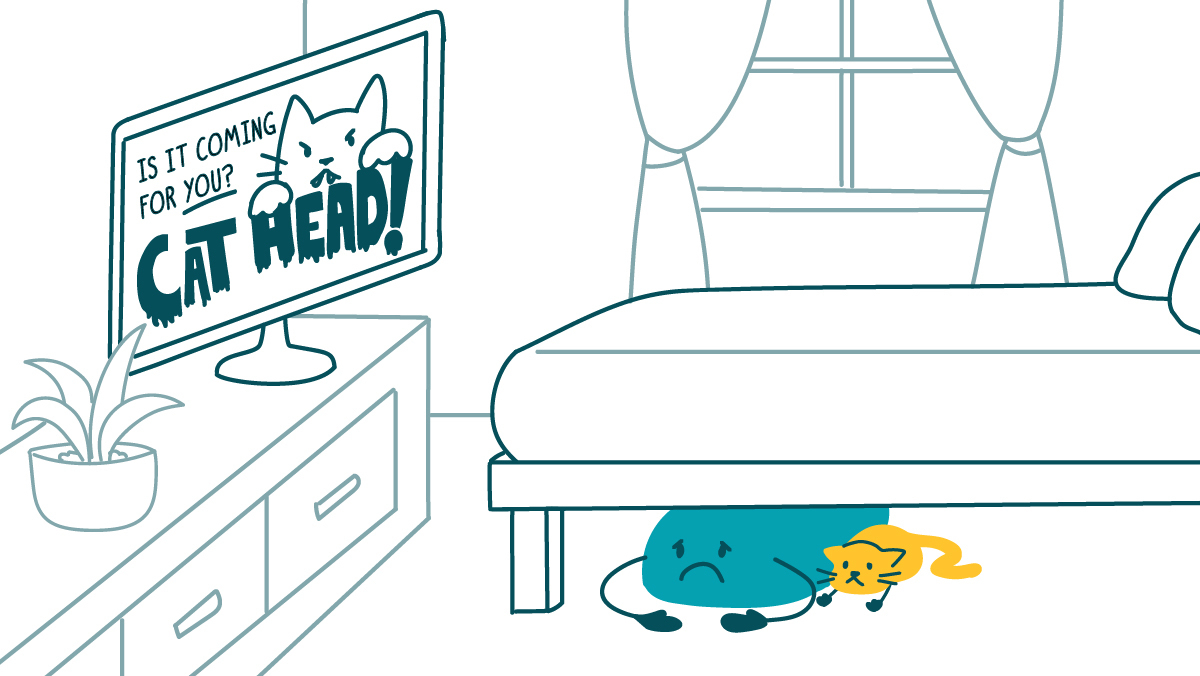 A TV screen shows an angry cat and the words: “Is it coming for you? CAT HEAD!” A doodle and a cat cower beneath a bed nearby.