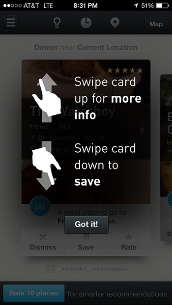 Screenshot of a phone screen with an instruction that says: "Swipe card up for more info" with an up arrow and hand shape beside it representing a swipe up motion. Below that, an instruction says: "Swipe card down to save" with a down arrow and hand shape beside it representing a swipe down motion. Below those instructions, a button says: "Got it!" 