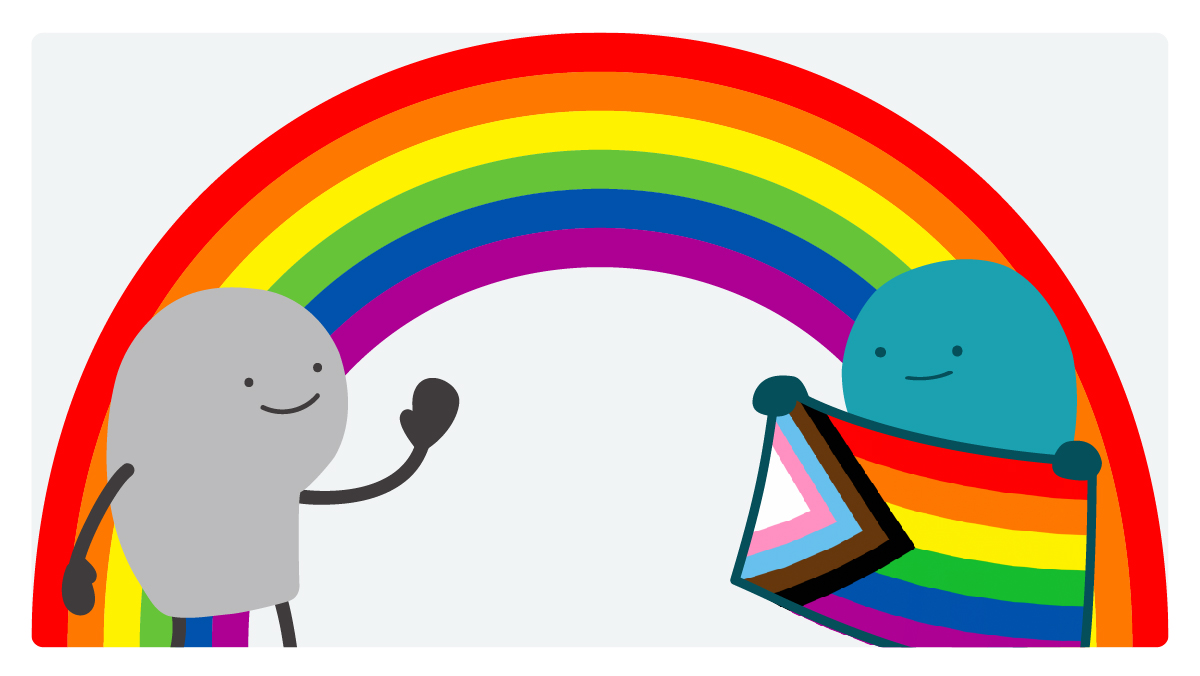 Two doodles are standing on opposite sides of a rainbow. The doodle on the left is in black and white, and the doodle on the right shows off the colors of the Progress Pride Flag.